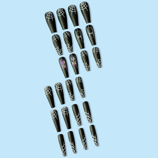 Dark Spider Halloween themed nail art set with web pattern and glue.