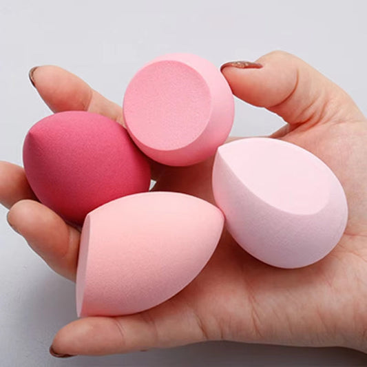 Make Up Blender set with various puff shapes for versatile makeup application.