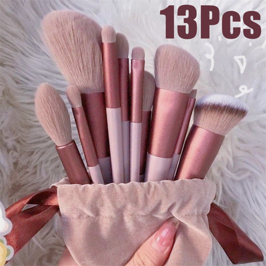 13Pcs soft makeup brush set in a cloth bag, including foundation, powder, shadow, blush, and more.