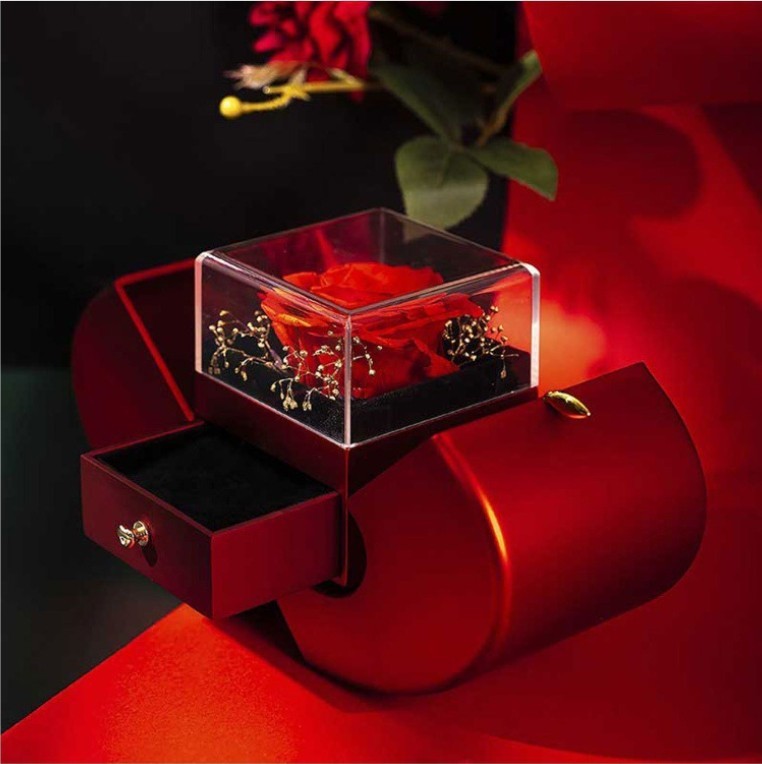 Red apple shaped fashion jewelry box with preserved rose, perfect for gifts like Mother's Day and Valentine's Day.