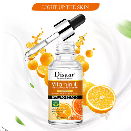 Hyaluronic Acid Vitamin C Face Serum bottle with dropper and orange slices, labeled for skin brightening and moisturizing.