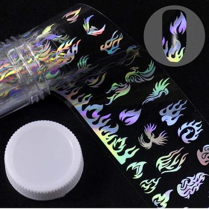 Colorful nail stickers in plastic bottle with flame designs.