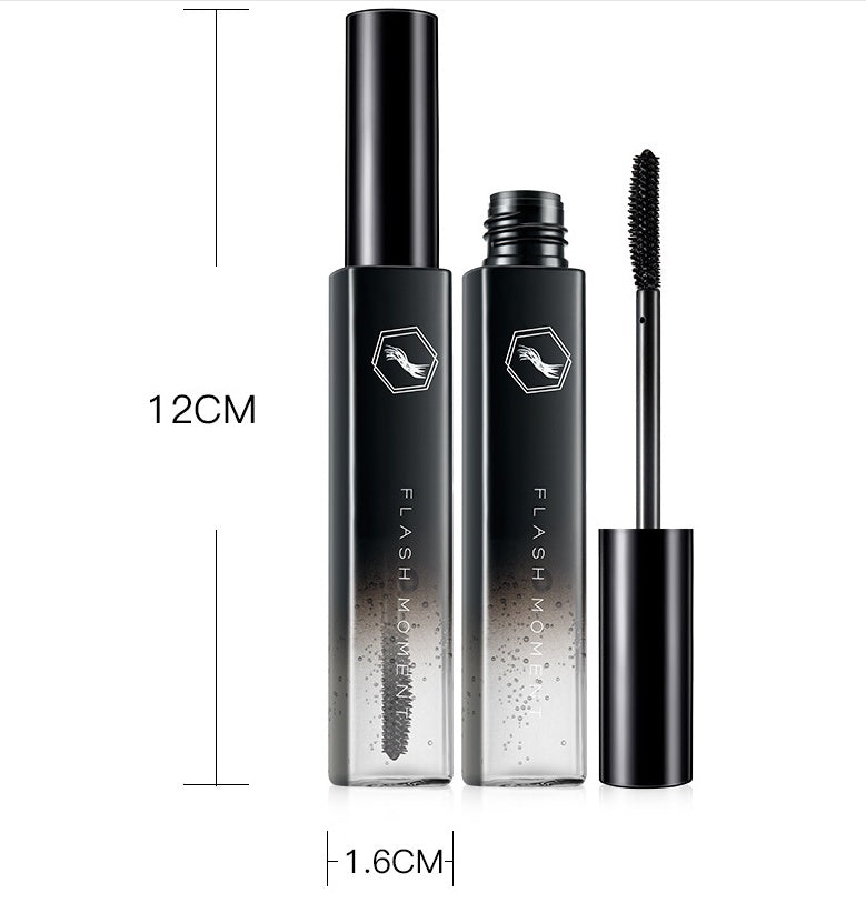 Broken hair artifact styling liquid bottle with brush applicator, 18ml size.