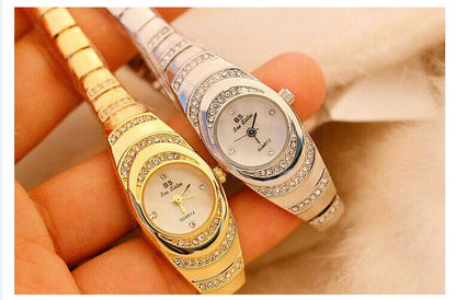 Elegant ladies gold and silver diamond wristwatches with fashion bracelet designs.