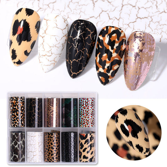 Manicure nail sticker set featuring snake and star designs, boxed presentation.