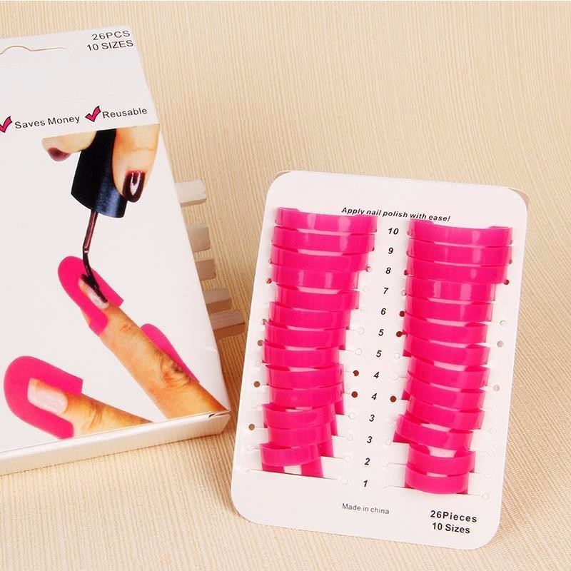 Nail Tools Nail Polish Model Clip set with 26 pieces for preventing overflow, shown in pink with packaging.