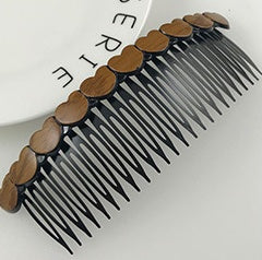 Retro-style hair comb for women, made of plastic and resin, ideal for styling waves.