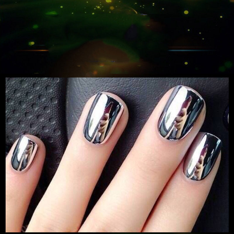 Mirror Nail Polish with reflective chrome finish on nails.