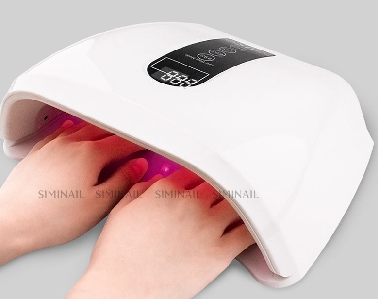 96W LED nail dryer with multiple timer settings, infrared sensor, and space for hands and feet.