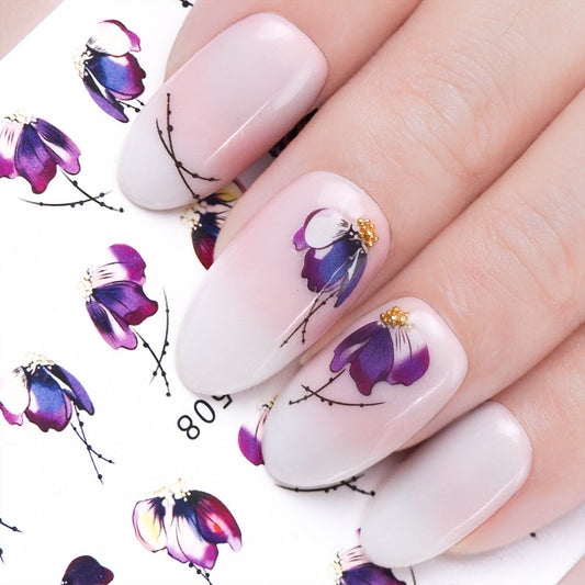 Nail art with butterfly flower water transfer decal stickers.