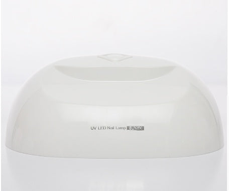 Portable LED Nail Oil Glue Dryer in white design.