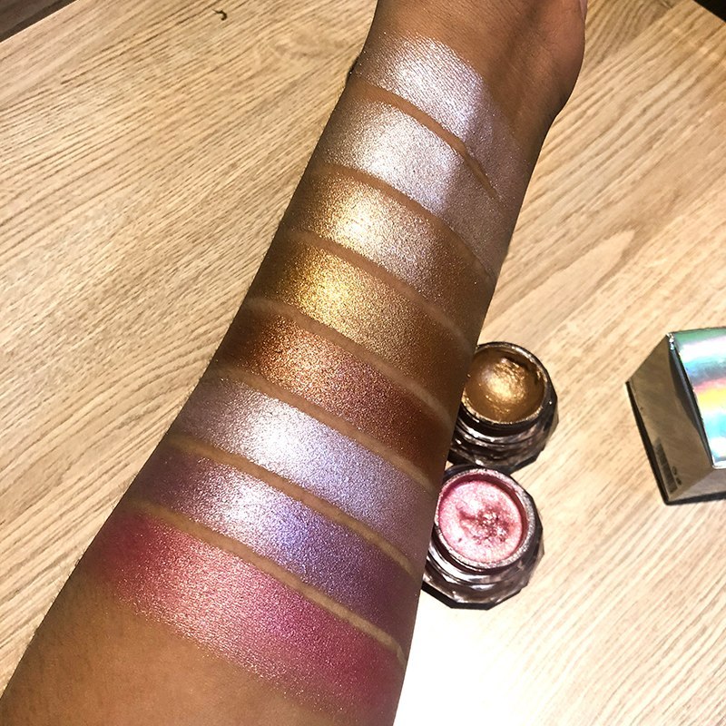 Swatches of Face Highlighter Jelly in various shimmering shades on arm.