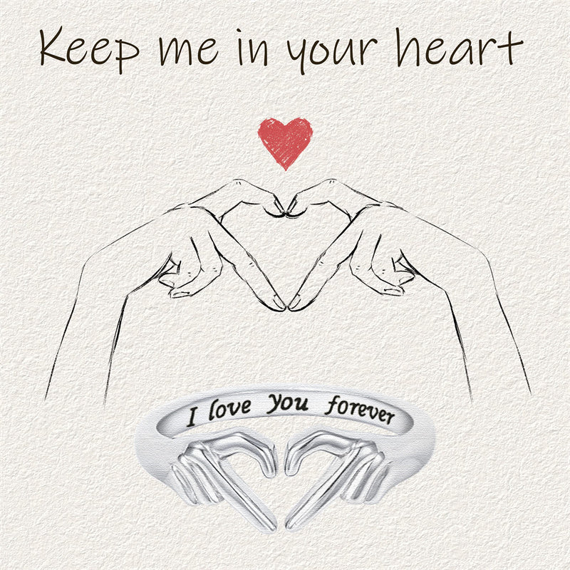 Romantic Heart Hand Hug fashion ring with engraved "I love you forever" message.