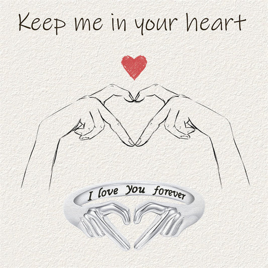Romantic Heart Hand Hug fashion ring with engraved "I love you forever" message.