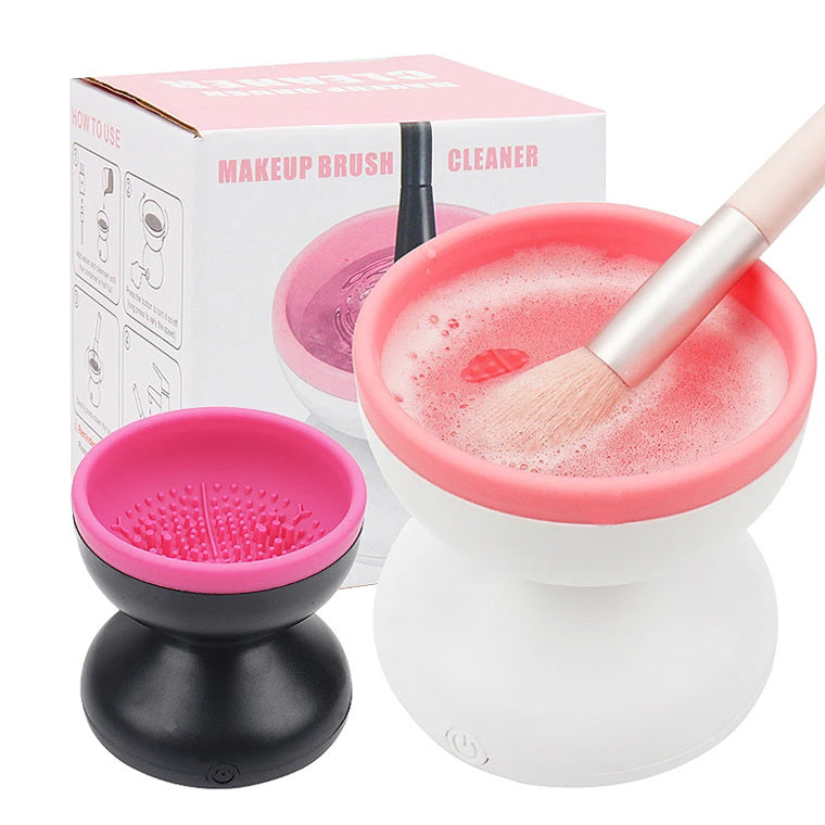 Electric makeup brush cleaner machine with silicone texture design and compact size in white and pink.