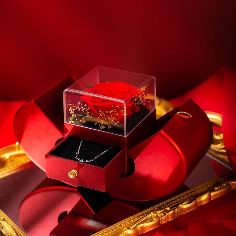 Red apple-shaped fashion jewelry box with eternal rose for Valentine's Day and Mother's Day gifts.