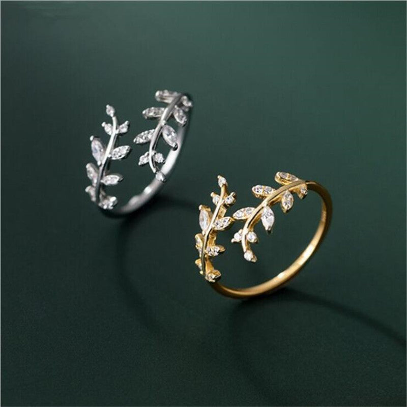 Fashion branch ring for women, featuring a leaf design in silver and gold tones.