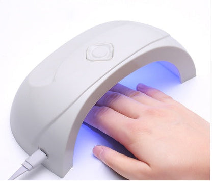 Portable LED Nail Oil Glue Dryer in use.