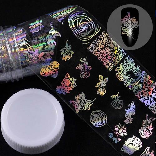 Holographic floral nail sticker roll in plastic bottle packaging.