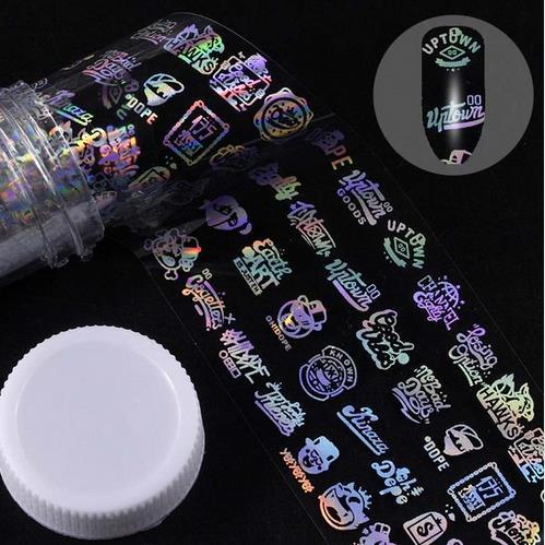 Nail sticker roll with colorful graphics in plastic packaging.