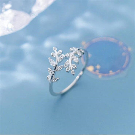 Elegant branch ring with leaf design, silver-plated copper, ideal fashion jewelry for women.