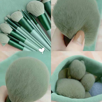 13 green makeup brushes with soft, fine bristles and durable plastic handles in a cloth bag from the 13Pcs Makeup Brush Set.
