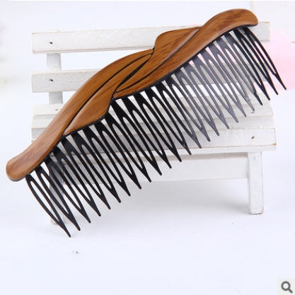 Fashion retro hair comb made of plastic and resin, Korean style for women with wave styling.