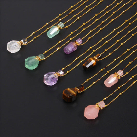 Crystal pendant necklaces in perfume bottle shapes with tiger eye and crystal materials.