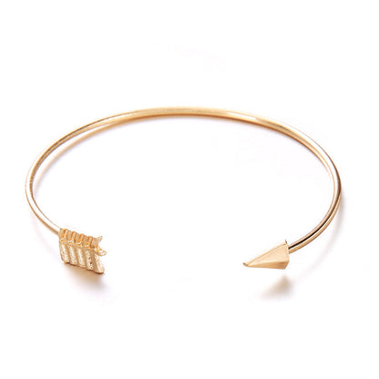 Women's Vintage Cuff Arrow Knotted Bracelet in gold alloy with unique design.