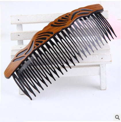 Fashion retro hair comb made of plastic resin with Korean style design for women.
