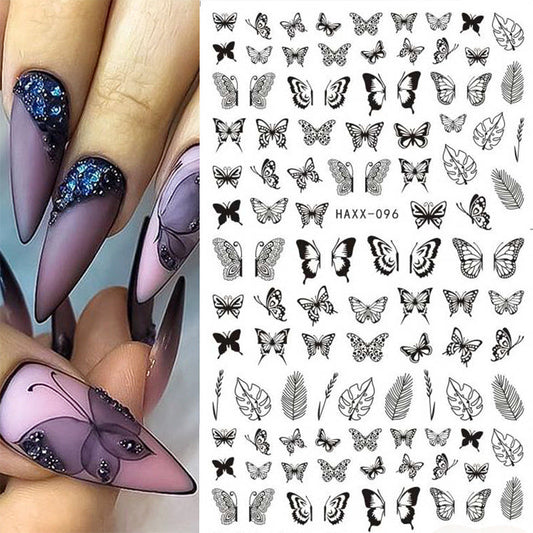 Black butterfly and white flower nail stickers for manicure.