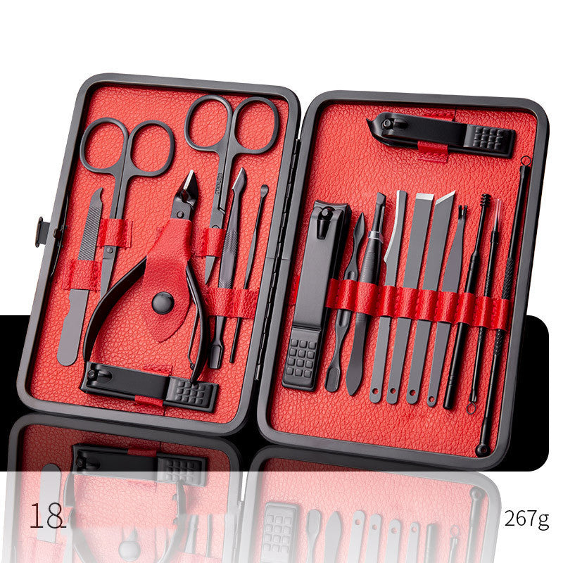 Professional nail care set in black and red leather case with scissors and clippers.