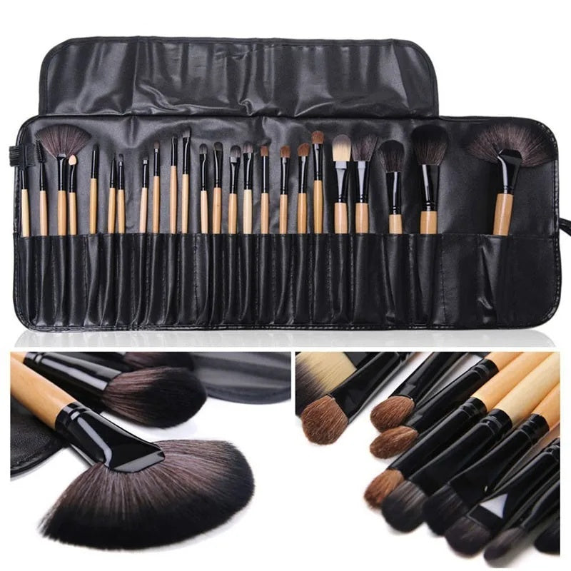 Gift bag of 24 professional makeup brushes with wooden handles in protective roll-up case.