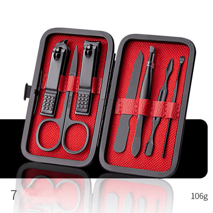 Professional scissors nail clippers set in black and red leather case.