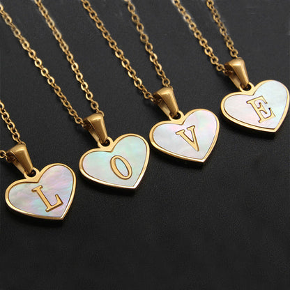 Heart-shaped 26 letter necklace with white shell pendant and gold chain, personalized clavicle chain jewelry for women.